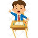 Cute School Boy Sitting At Desk  Icon