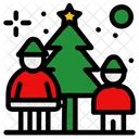 Navidad niños y árbol  Icono