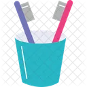Verre avec deux brosses  Icône