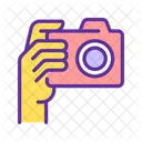 Yellow hand with camera  Icon