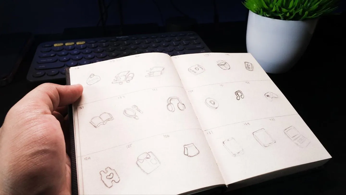 A sketchbook with sketches of icons